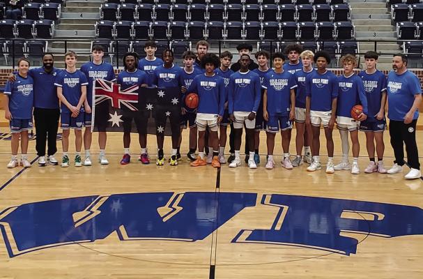 This year there were two Australian teams in the Wills Point Classic boys basketball tournament. One team gave the tigers magnets from Australia and one gave them shirts and took this picture. Photo courtesy of Wills Point ISD Athletics Facebook page