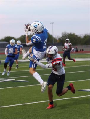 Photo by Regina DeDominicis WPISD Yearbook staff Wills Point Tiger receiver Cooper O’Neal (3) makes an acrobatic catch Sept. 15 against Waxahachie Life. The Tigers will take a twogame winning streak into Paris North Lamar Sept. 22 to close out their non-district schedule before enjoying an open date Sept. 29.